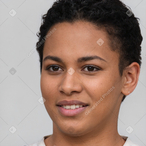 Joyful latino young-adult female with short  brown hair and brown eyes