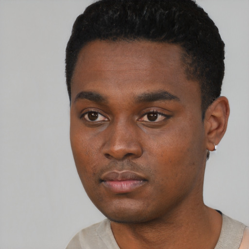 Neutral black young-adult male with short  black hair and brown eyes