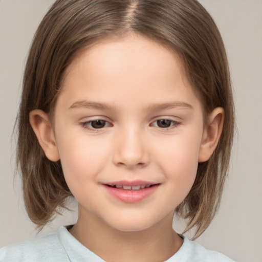 Joyful white child female with medium  brown hair and brown eyes