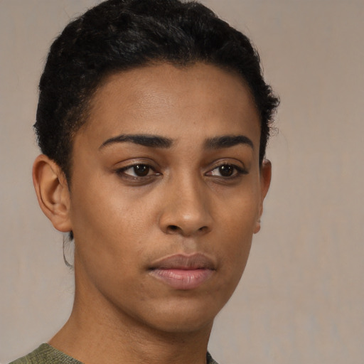 Neutral black young-adult female with short  brown hair and brown eyes