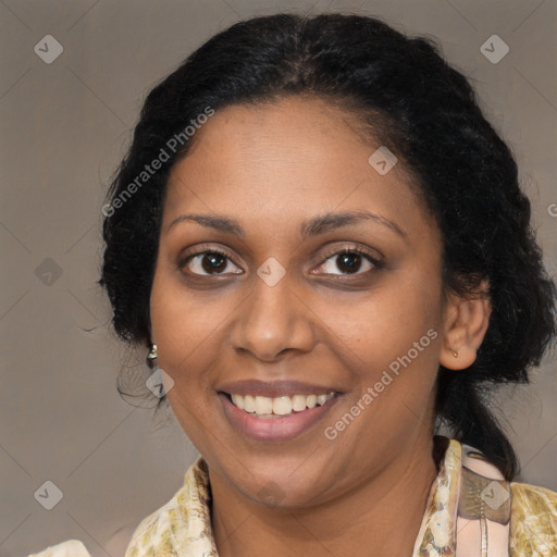 Joyful black young-adult female with medium  brown hair and brown eyes