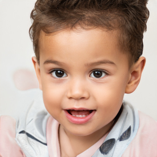 Joyful white child male with short  brown hair and brown eyes