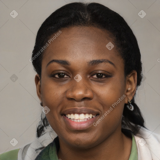 Joyful black young-adult female with medium  black hair and brown eyes