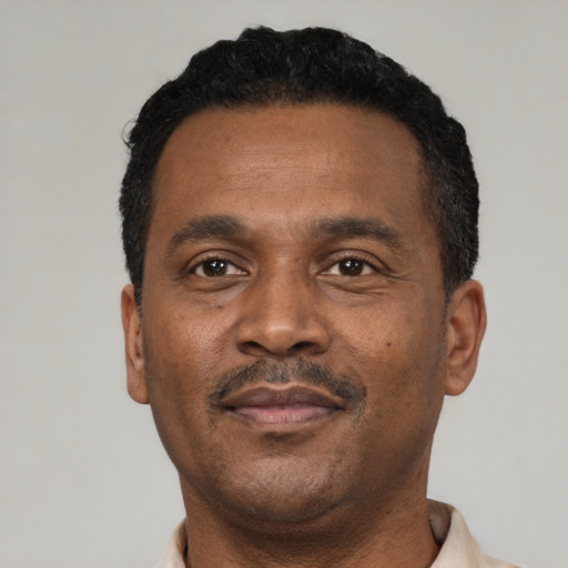 Neutral black adult male with short  black hair and brown eyes