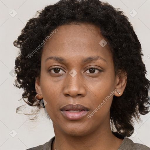 Neutral black young-adult female with short  brown hair and brown eyes