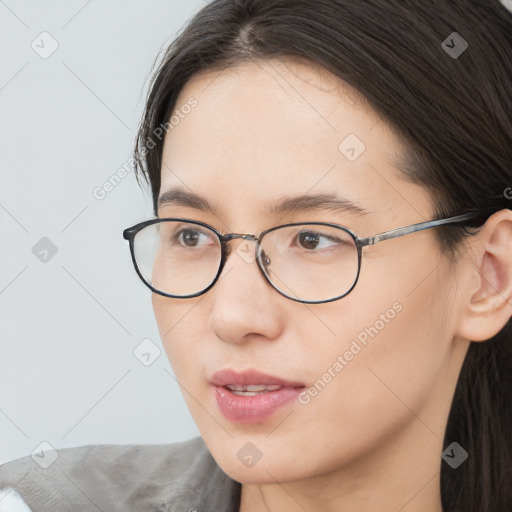 Neutral white young-adult female with medium  brown hair and brown eyes