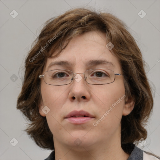 Neutral white adult female with medium  brown hair and green eyes