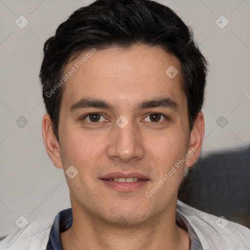 Joyful white young-adult male with short  black hair and brown eyes