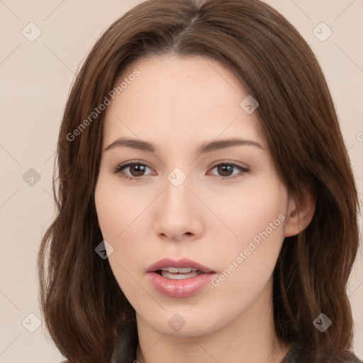 Neutral white young-adult female with long  brown hair and brown eyes