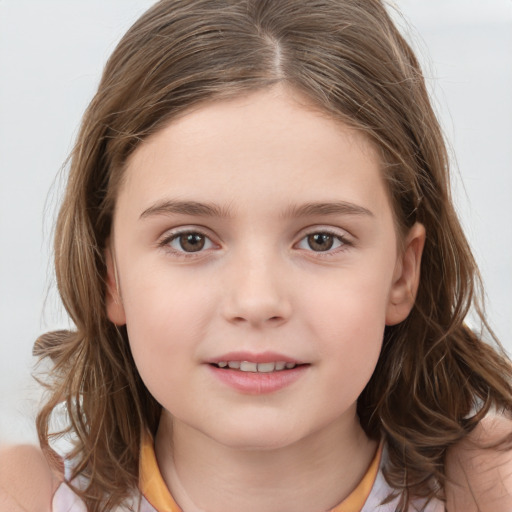 Joyful white child female with long  brown hair and brown eyes