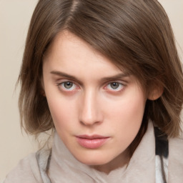 Neutral white young-adult female with medium  brown hair and grey eyes