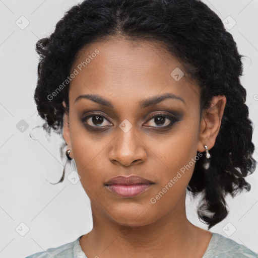 Joyful black young-adult female with long  black hair and brown eyes