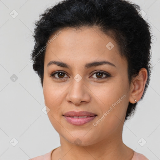 Joyful latino young-adult female with short  brown hair and brown eyes