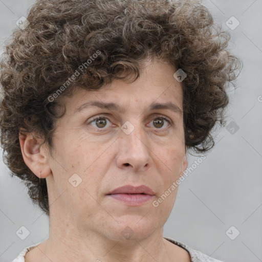 Joyful white adult male with short  brown hair and grey eyes