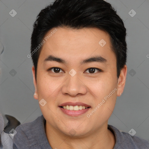 Joyful asian young-adult male with short  black hair and brown eyes