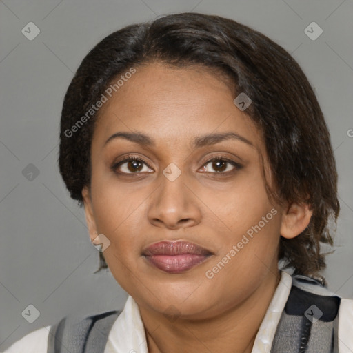 Joyful latino adult female with medium  brown hair and brown eyes