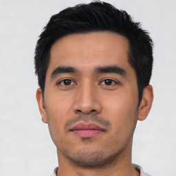 Neutral asian young-adult male with short  black hair and brown eyes