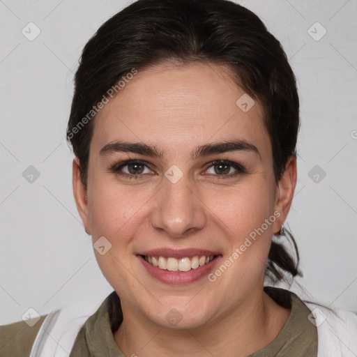 Joyful white young-adult female with medium  brown hair and brown eyes