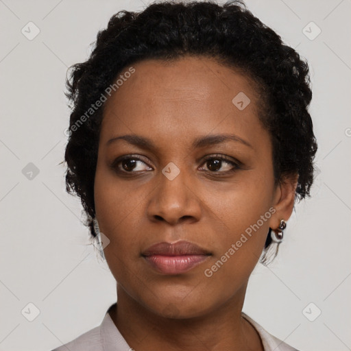 Neutral black young-adult female with short  black hair and brown eyes