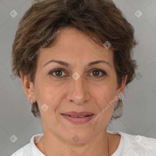 Joyful white adult female with short  brown hair and brown eyes