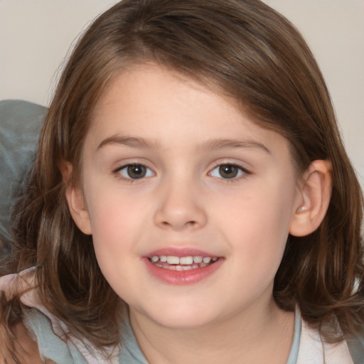 Joyful white child female with medium  brown hair and brown eyes