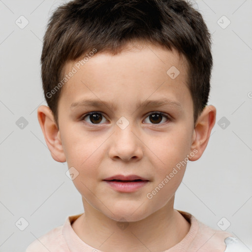 Joyful white child male with short  brown hair and brown eyes