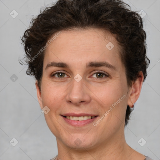 Joyful white adult female with short  brown hair and brown eyes