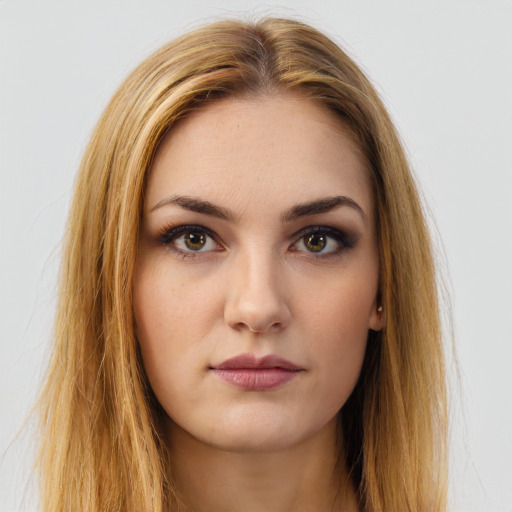 Neutral white young-adult female with long  brown hair and brown eyes