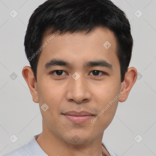 Joyful asian young-adult male with short  black hair and brown eyes