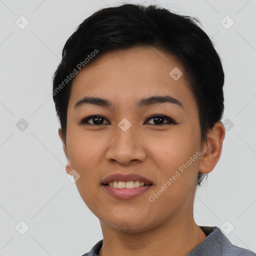 Joyful asian young-adult female with short  black hair and brown eyes