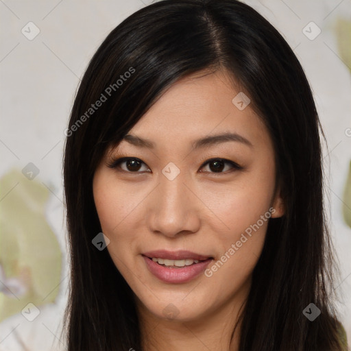 Joyful asian young-adult female with long  brown hair and brown eyes