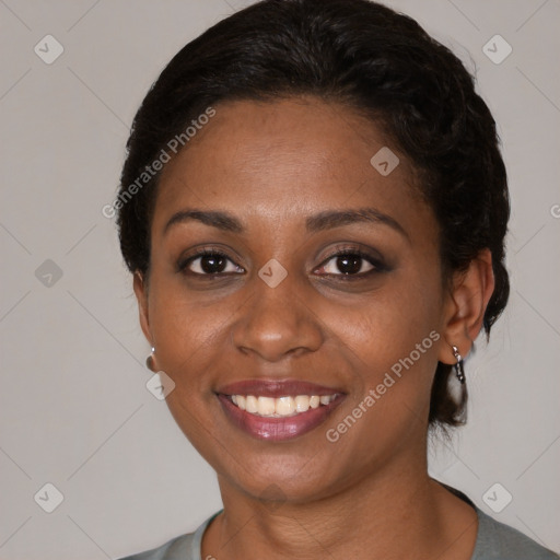 Joyful black young-adult female with medium  brown hair and brown eyes