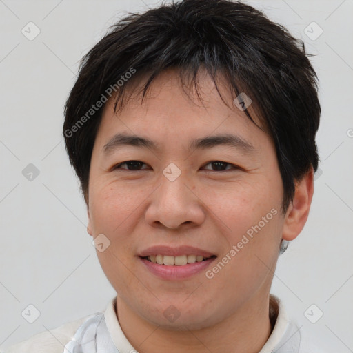 Joyful asian young-adult female with short  brown hair and brown eyes