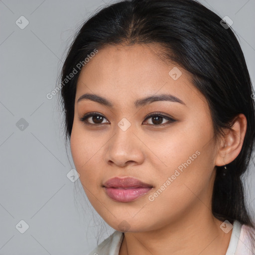 Joyful asian young-adult female with medium  brown hair and brown eyes