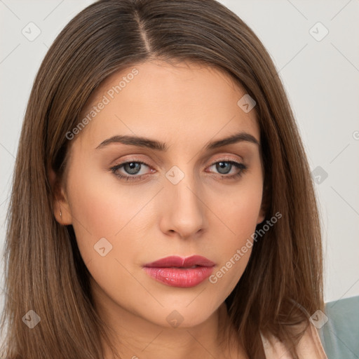 Neutral white young-adult female with long  brown hair and brown eyes