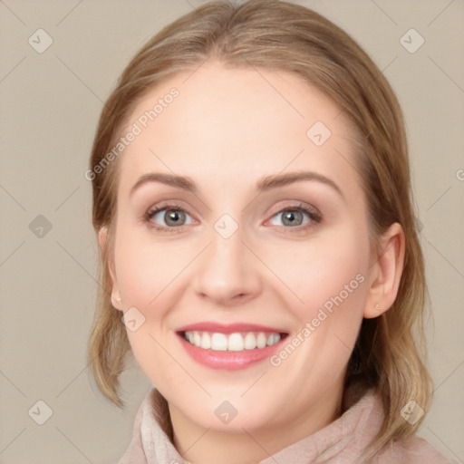 Joyful white young-adult female with medium  brown hair and blue eyes