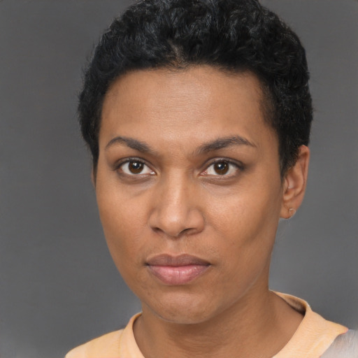 Neutral black adult female with short  black hair and brown eyes