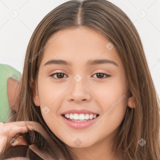 Joyful white child female with long  brown hair and brown eyes