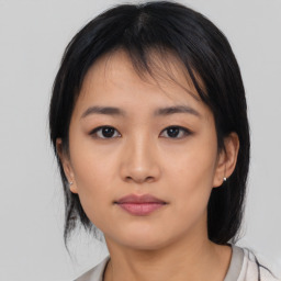 Neutral asian young-adult female with medium  black hair and brown eyes