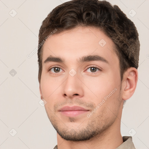 Neutral white young-adult male with short  brown hair and brown eyes