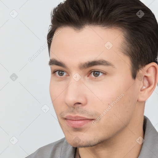 Neutral white young-adult male with short  brown hair and brown eyes