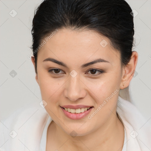 Joyful white young-adult female with long  brown hair and brown eyes