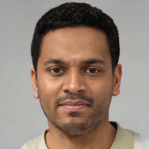 Neutral latino young-adult male with short  black hair and brown eyes