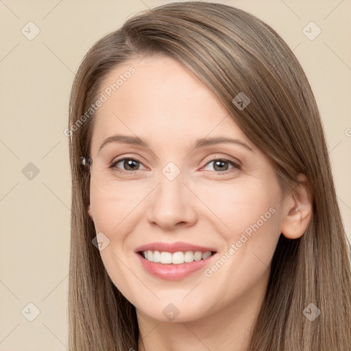 Joyful white young-adult female with long  brown hair and brown eyes