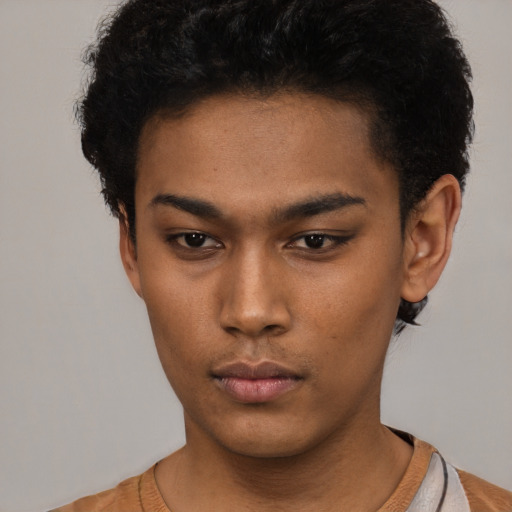 Neutral black young-adult female with short  black hair and brown eyes