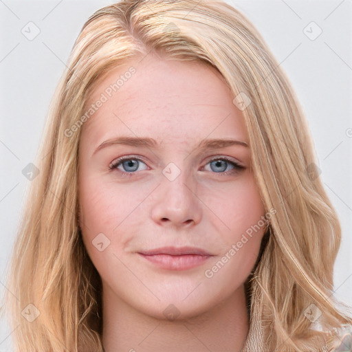 Joyful white young-adult female with long  brown hair and blue eyes