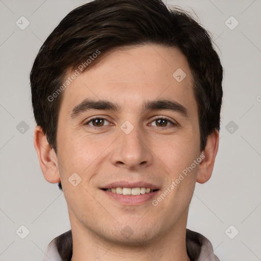 Joyful white young-adult male with short  brown hair and brown eyes