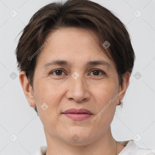 Joyful white adult female with short  brown hair and brown eyes