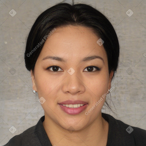 Joyful asian young-adult female with medium  black hair and brown eyes