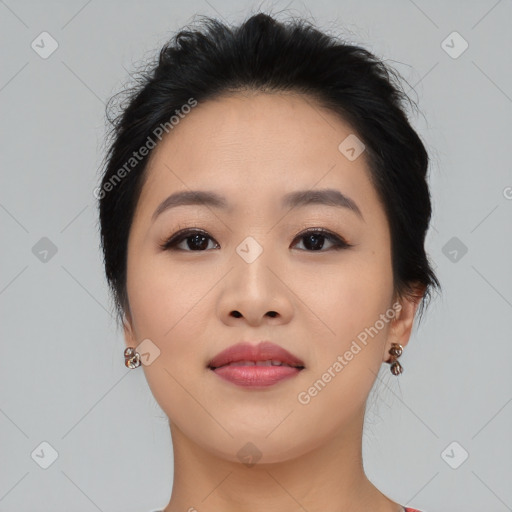 Joyful asian young-adult female with medium  black hair and brown eyes